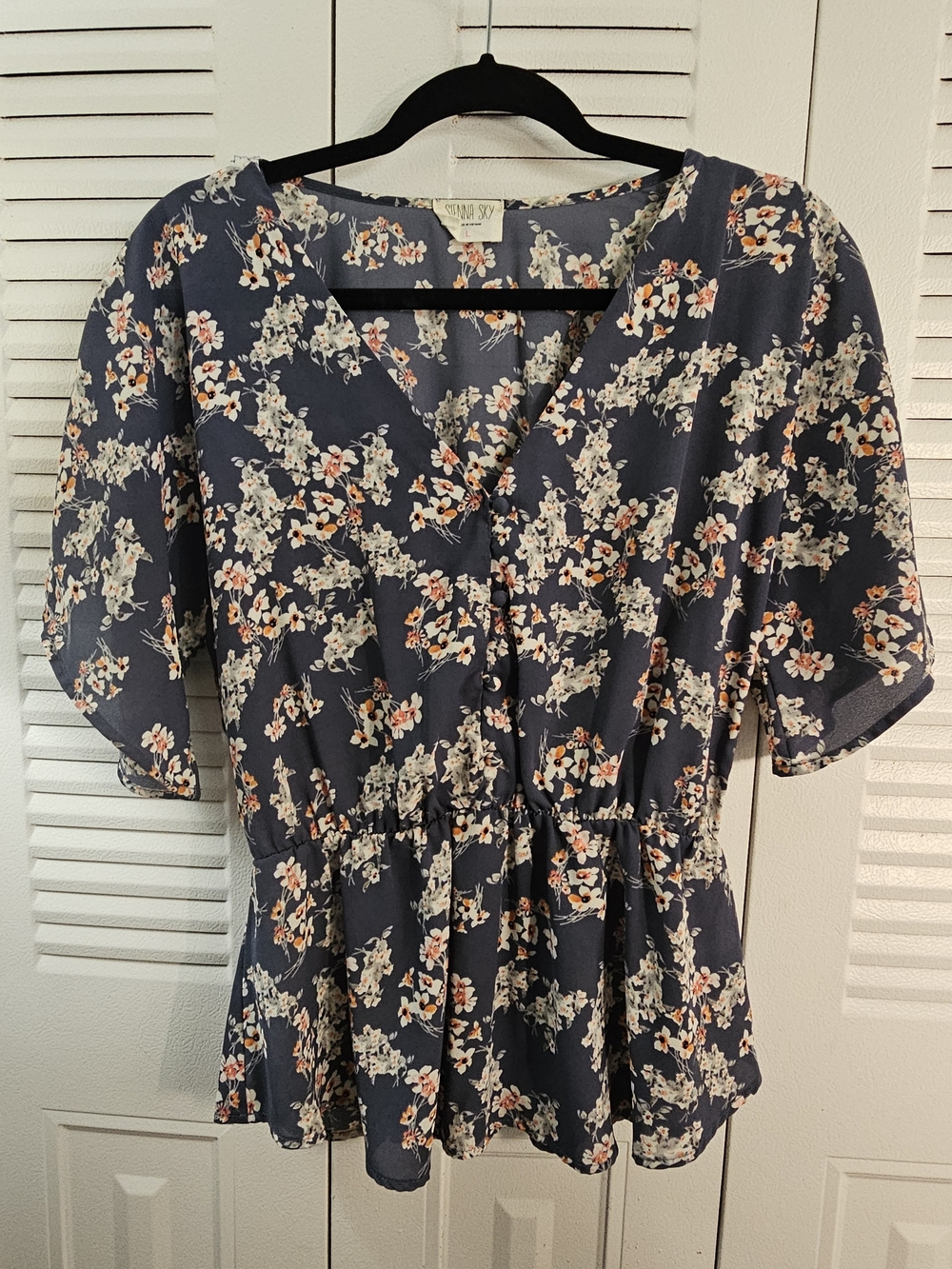Sienna Sky Navy Floral V-Neck Peplum Blouse